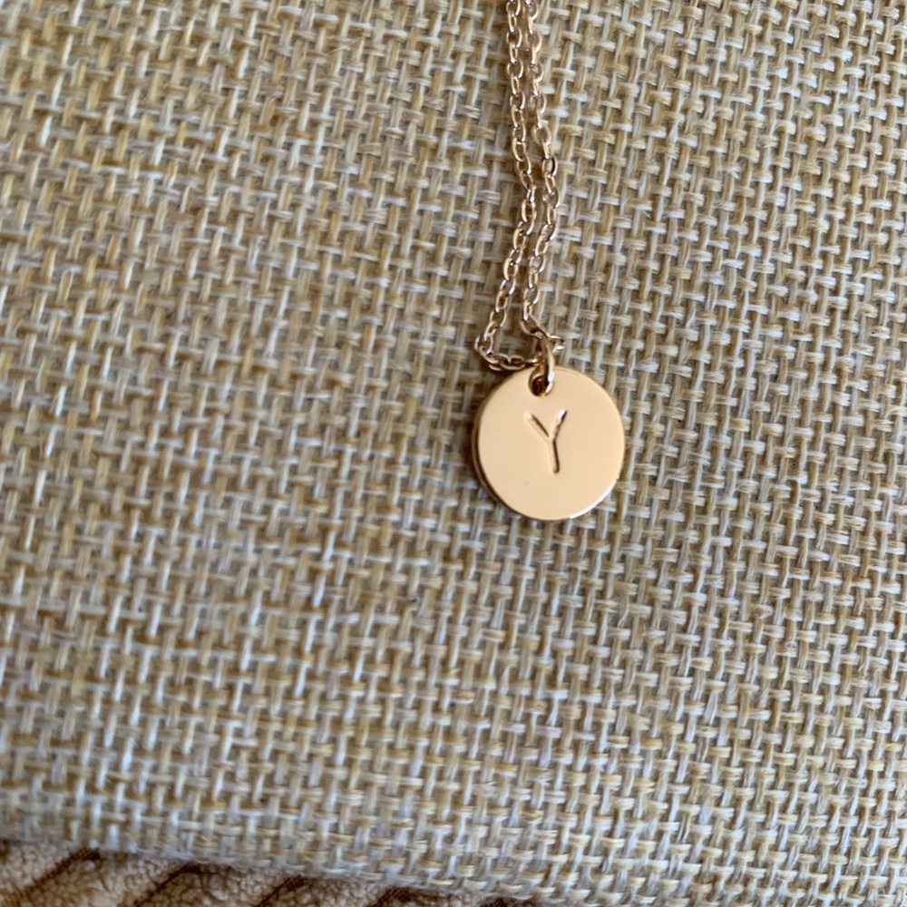 Reversible gold plated Y initial necklace.